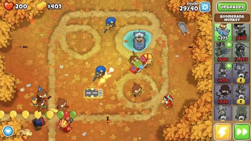 alt text: Bloons TD 6 - Chú khỉ đang bắn phi tiêu vào những quả bóng bay