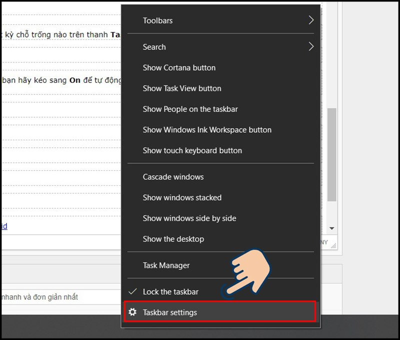 Click phải vào khoảng trống trên thanh Taskbar và chọn Taskbar settings