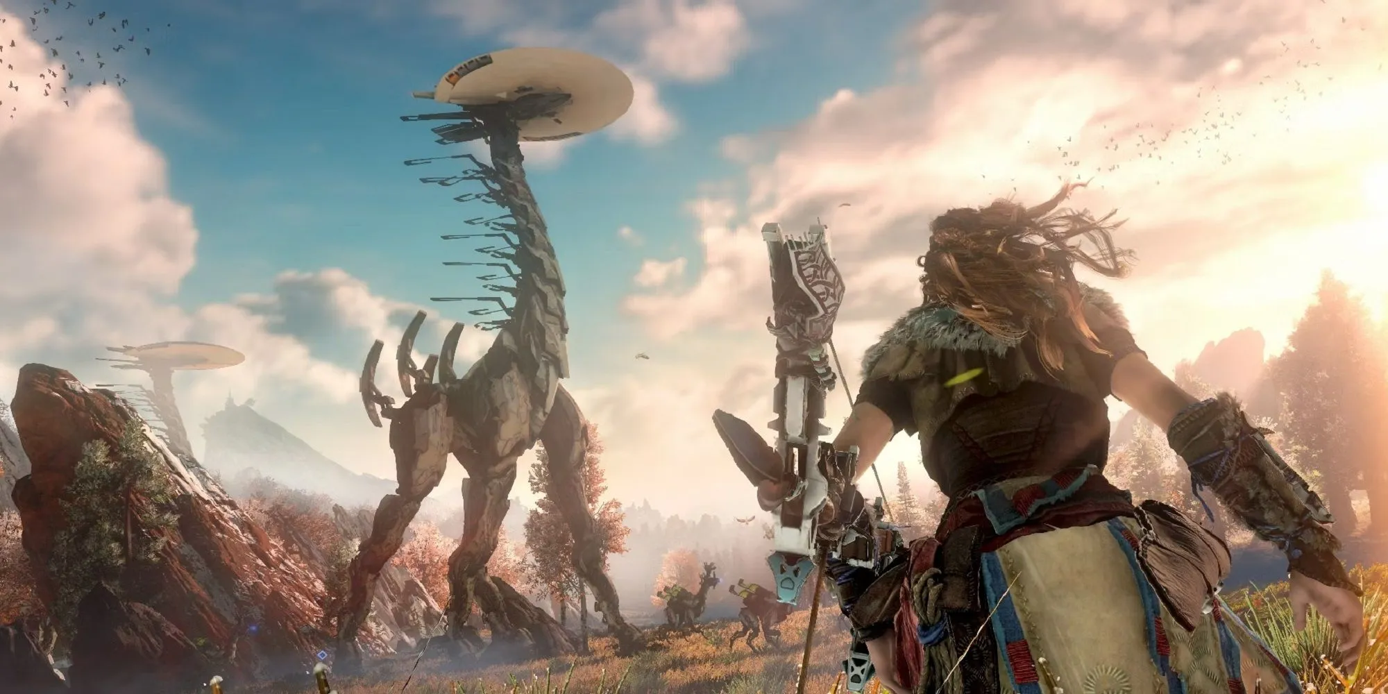 Aloy và một cỗ máy Tallneck khổng lồ trong thế giới mở đầy màu sắc của Horizon Zero Dawn