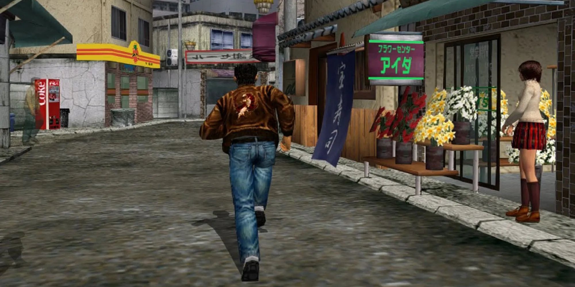 Ảnh chụp màn hình gameplay của Shenmue cho thấy nhân vật Ryo Hazuki đang đi trên đường phố Nhật Bản