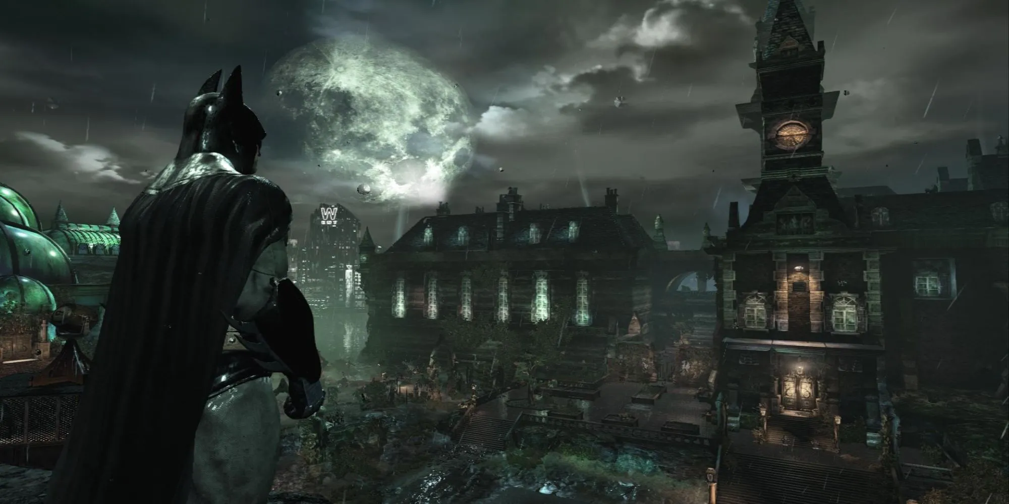 Batman đứng trong khu vực u tối bên trong nhà thương điên Arkham trong game Batman Arkham Asylum