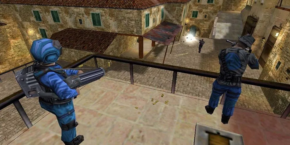 Hai người chơi Team Fortress Classic đang giao tranh trên bản đồ game.