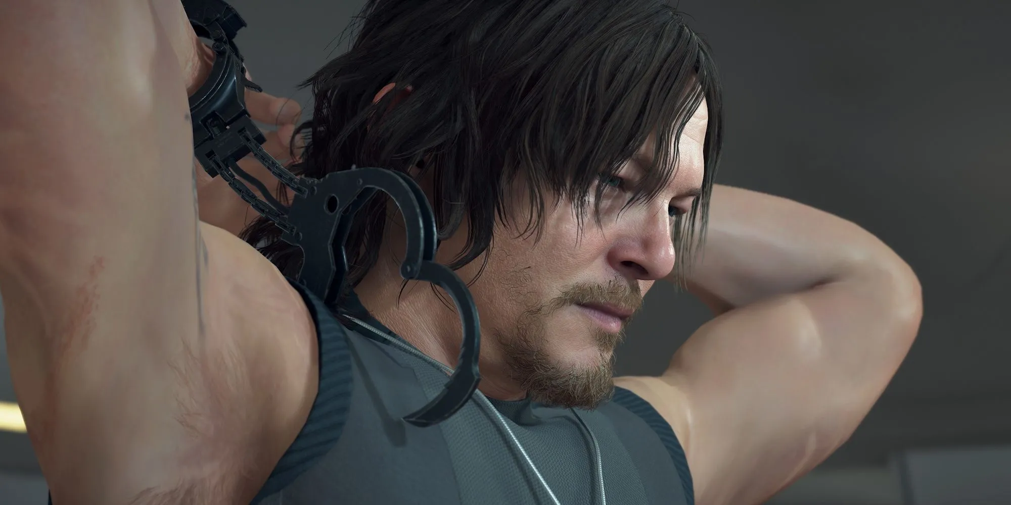Hình ảnh Sam Porter Bridges trong Death Stranding đứng trong môi trường game