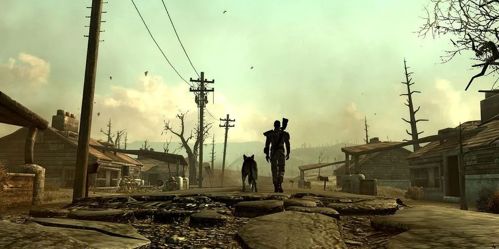 Nhân vật chính và Dogmeat trên con đường hoang tàn ở Fallout 3