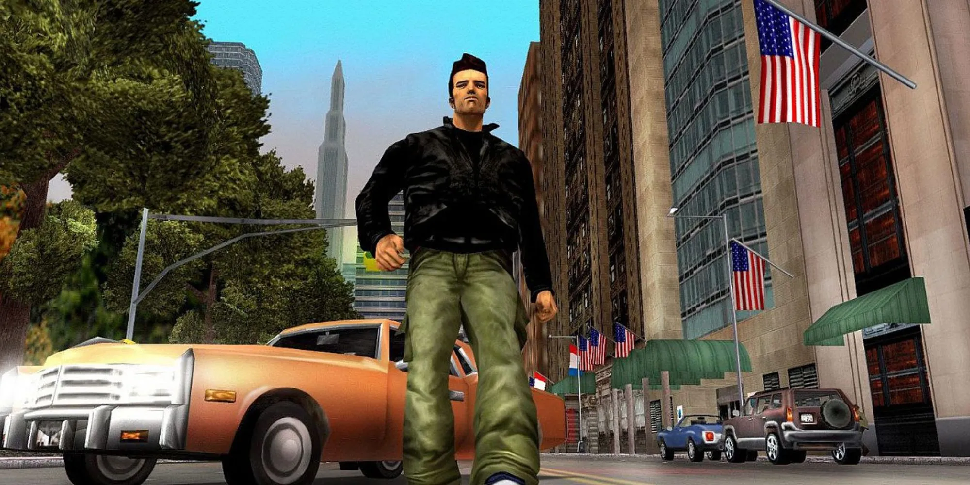 Nhân vật Claude trong Grand Theft Auto III PS2 đứng giữa đường phố Liberty City với đồ họa 3D sơ khai