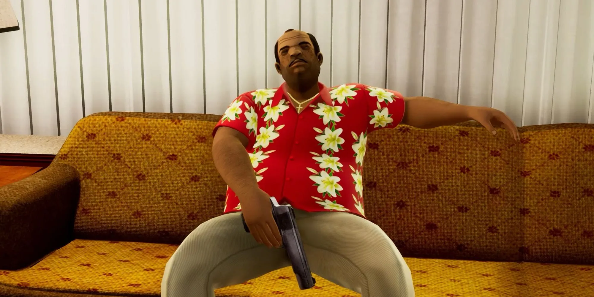 Ricardo Diaz, trùm mafia trong GTA Vice City, đang ngồi trên ghế với vẻ mặt cau có
