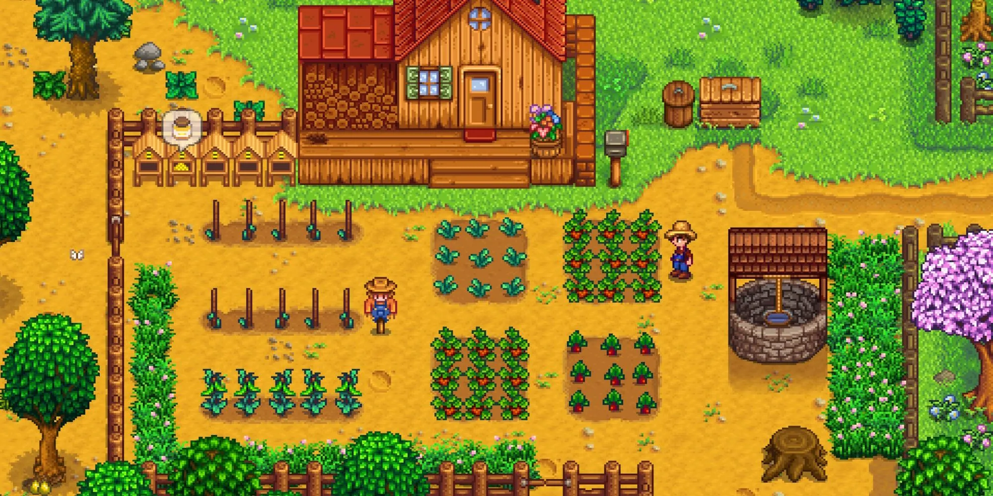 Toàn cảnh nông trại của người chơi trong Stardew Valley với cây trồng, giếng nước và nhà ong