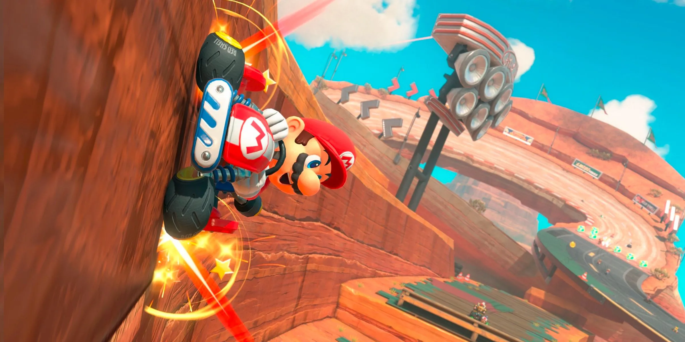 Mario riding on a wall in Mario Bros. Circuit in Mario Kart World.