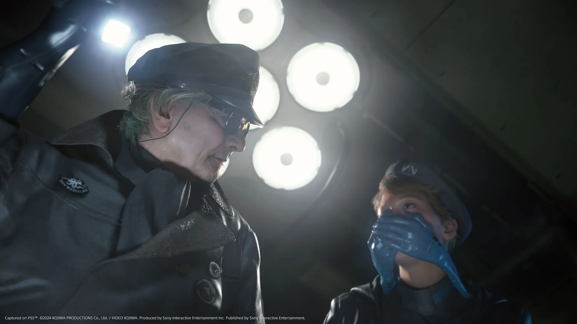 Sam Porter Bridges đứng cạnh chiếc xe tải, một phương tiện di chuyển trong Death Stranding 2