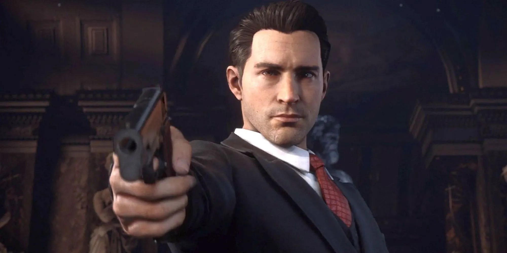 Tommy Angelo đứng trong khung cảnh thành phố New Haven cổ điển của Mafia Definitive Edition